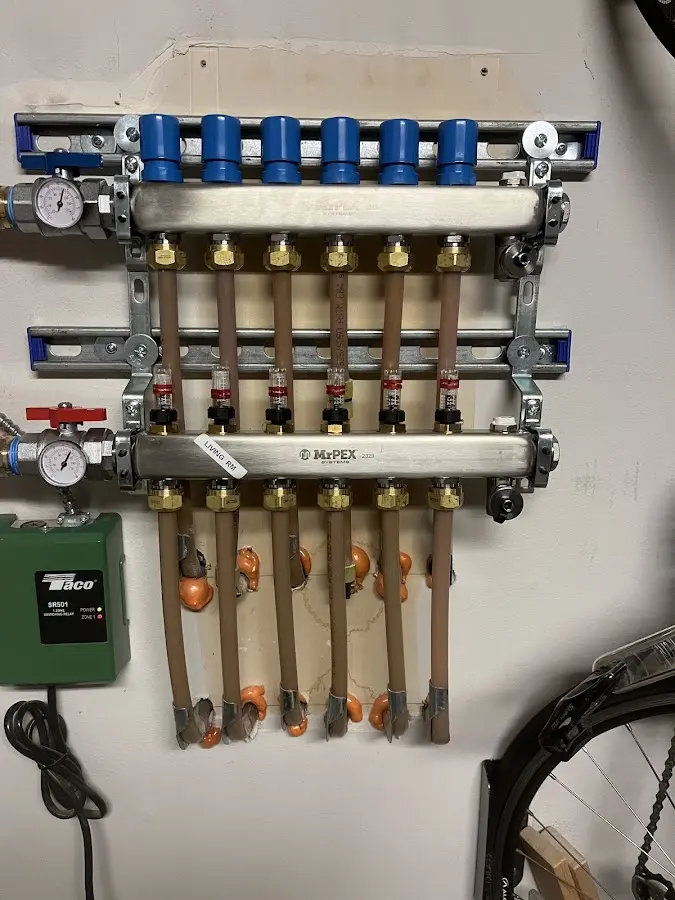 Plumber performing Water Heater Repair at a residential property in Vancouver